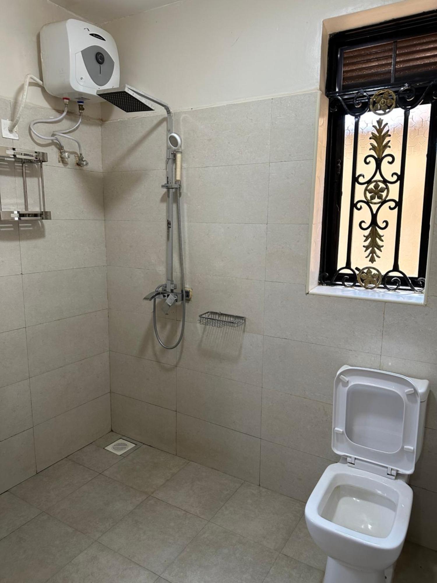 Elena & Kimberly Apartment Gulu ภายนอก รูปภาพ